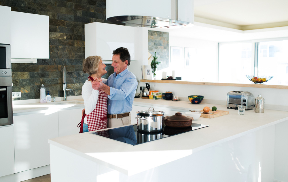 Mature couple in condo kitchen