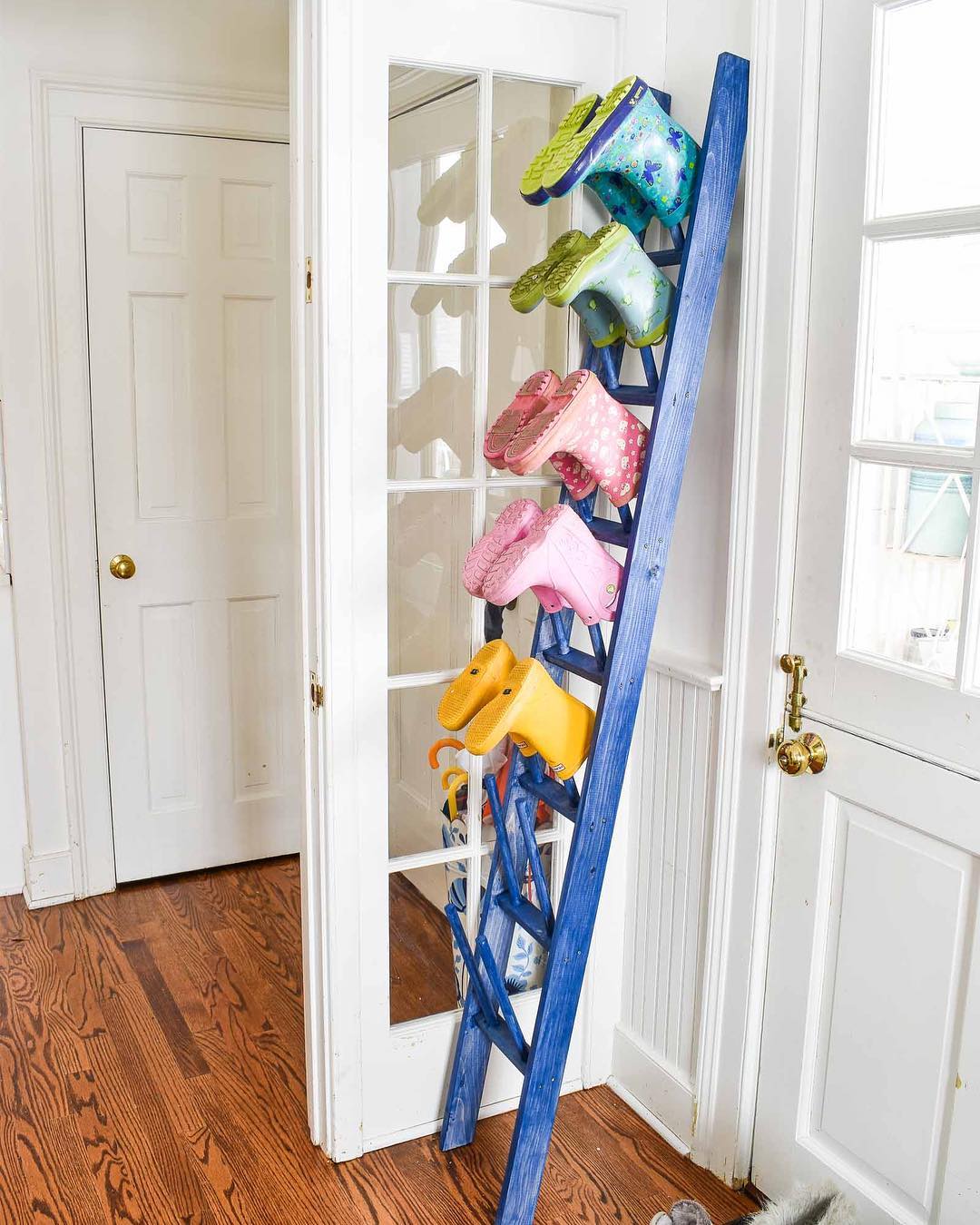 Ladder Repurposed for Boot Storage. Photo by Instagram user @atcharlotteshouse