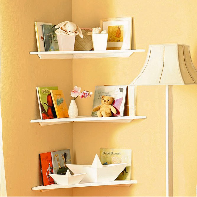 Corner Shelves Storing Toys and Books in Kids Room. Photo by Instagram user @handymanmagazine