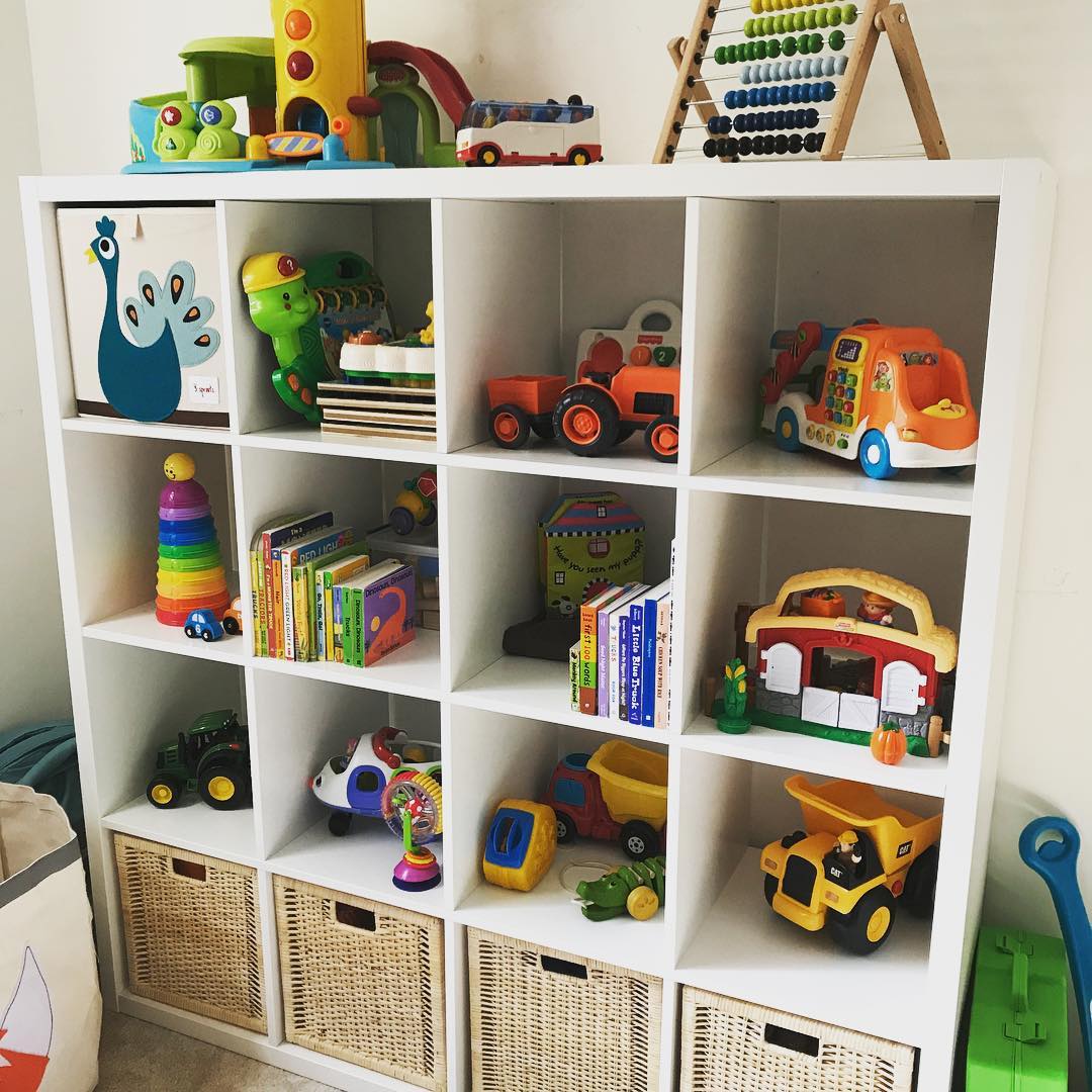 Storage Cubbies Filled with Toys in Kids Room. Photo by Instagram user @emilymorganized