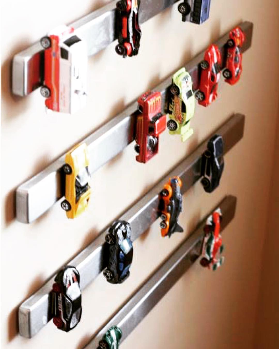Magnetic Strips on Walls to Hold Toy Cars. Photo by Instagram user @precision organizing