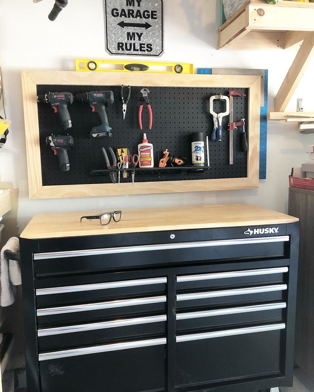 Pegboard with Saws, Hammers, and Tools in a Garage. Photo by Instagram user @daniraehome