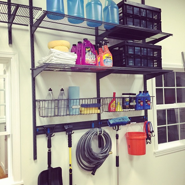 Garage Shelving with Car Care Equipment and Supplies. Photo by Instagram user @organizedliving