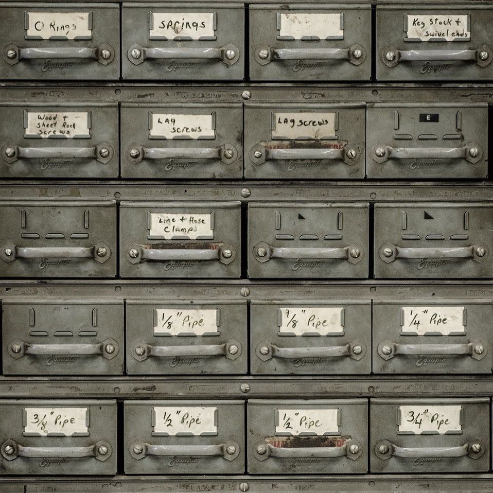 Card Catalog Boxes Storing Bolts and Pipes. Photo by Instagram user @organizewithkatherine