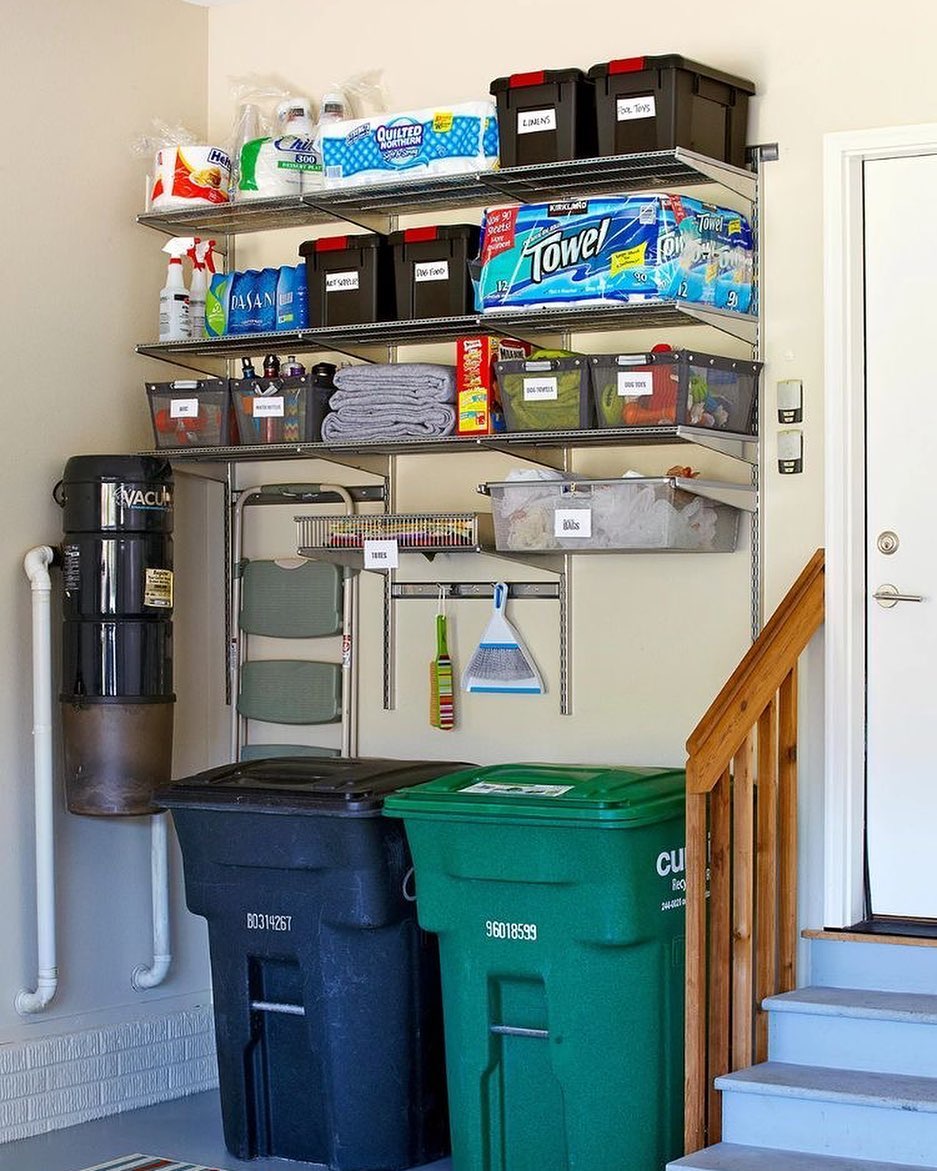 Garbage Cans Stored in Garage. Photo by Instagram user @simpleoverheaddoors