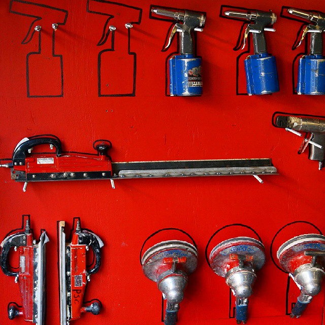 Garage Tools Outlined and Hanging on Wall. Photo by Instagram user @pacificservicecenter