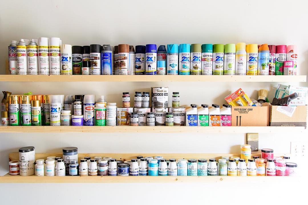 Cans of Paint on Shelves in Garage. Photo by Instagram user @thekingstonhome