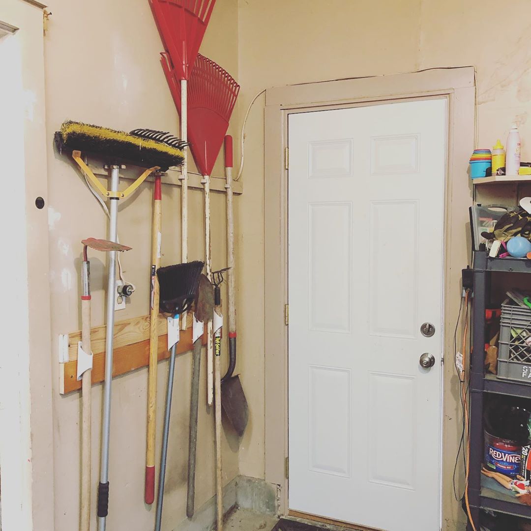 Gardening Tools Held Onto Garage Wall with PVC Pipe. Photo by Instagram user @jess_a__f