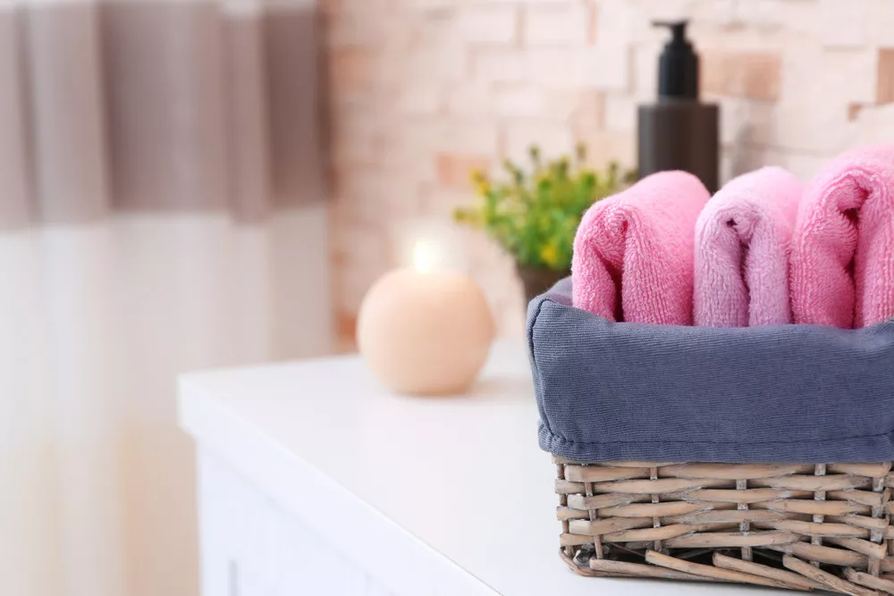 Towel Storage  Bathroom hand towels display, Hand towels bathroom, Towel  basket bathroom