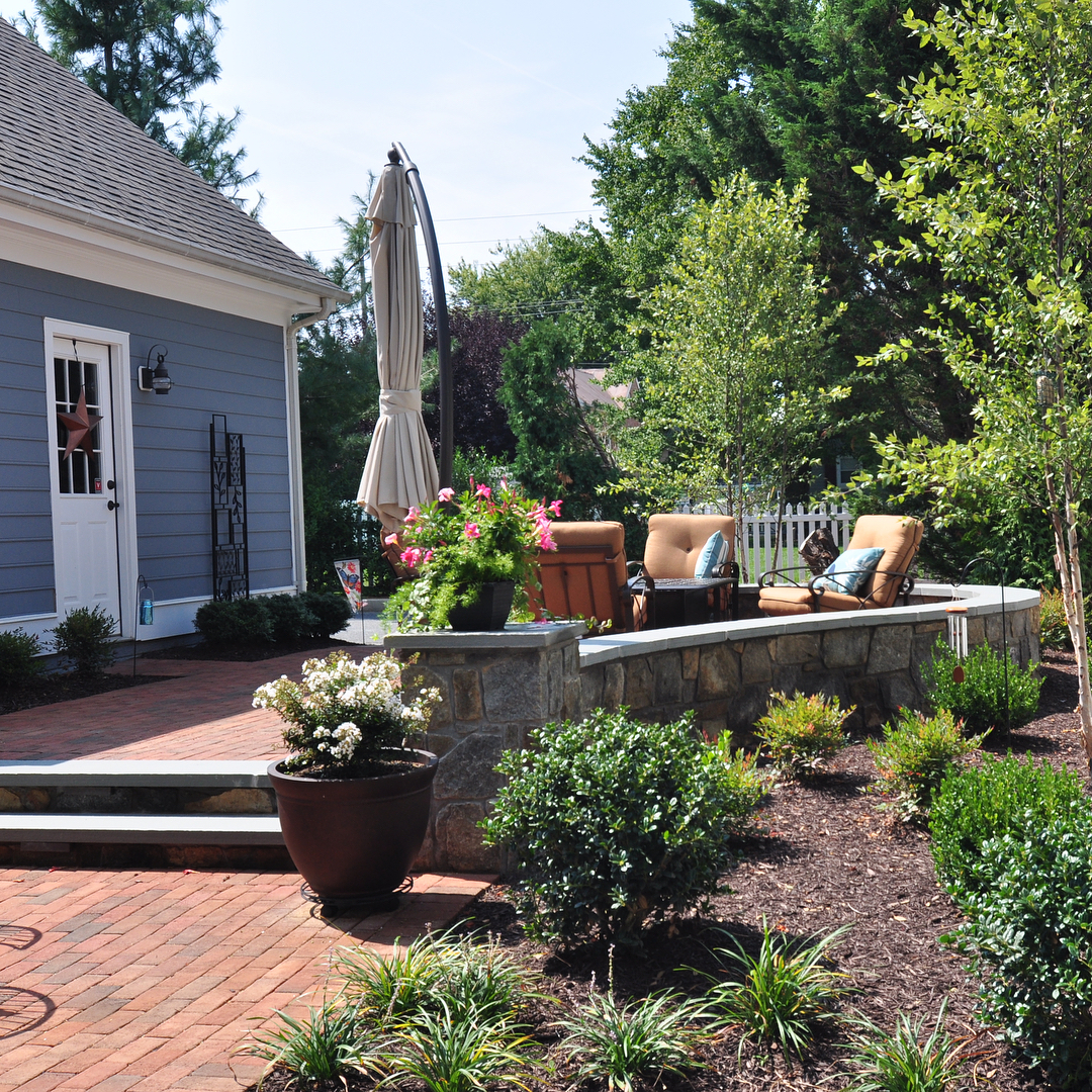 outdoor patio with multiple levels available photo by Instagram user @clearwaterlandscape