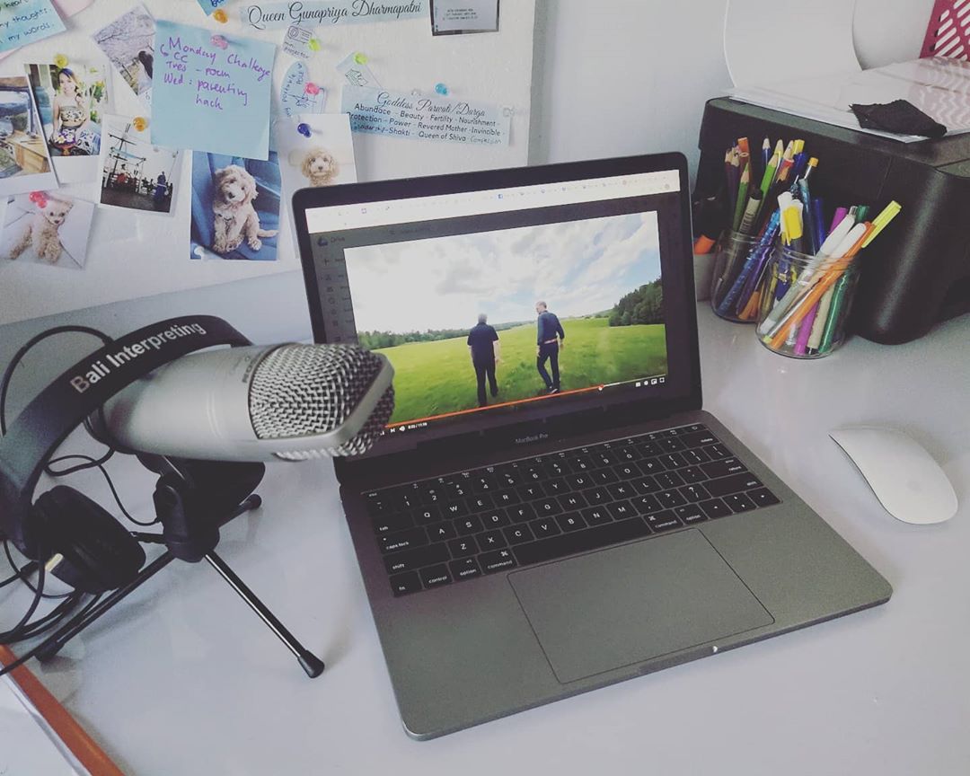 Video Playing on a Laptop and a Microphone Next to It. Photo by Instagram user @baliinterpreting