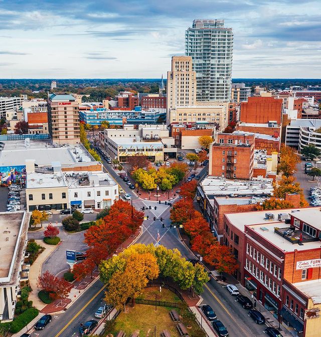 Cityscape of Durham in the fall. Photo by Instagram user @estlinhaiss.