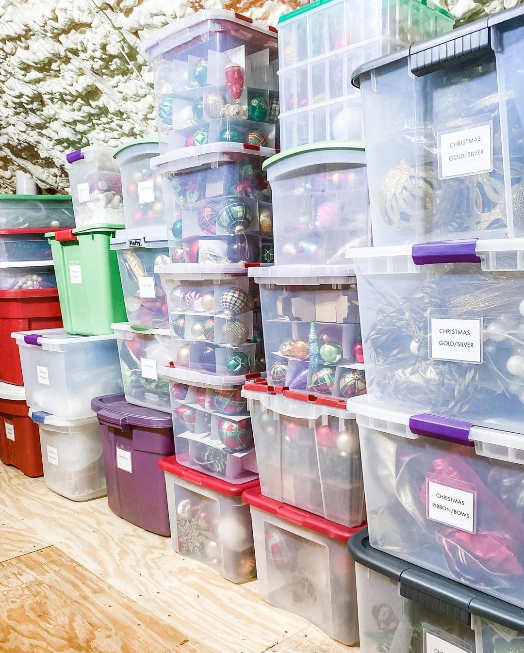 Clear Bins filled with Holiday Decorations. Photo by Instagram user @inlineorganizing