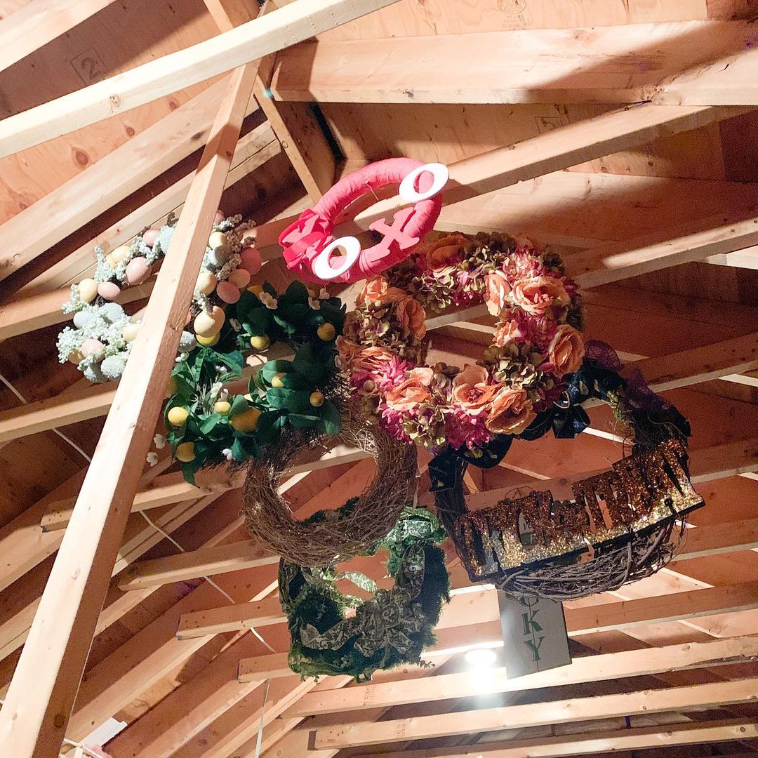 Decorations Hung on an Attic Beam. Photo by Instagram user @thelighterhome