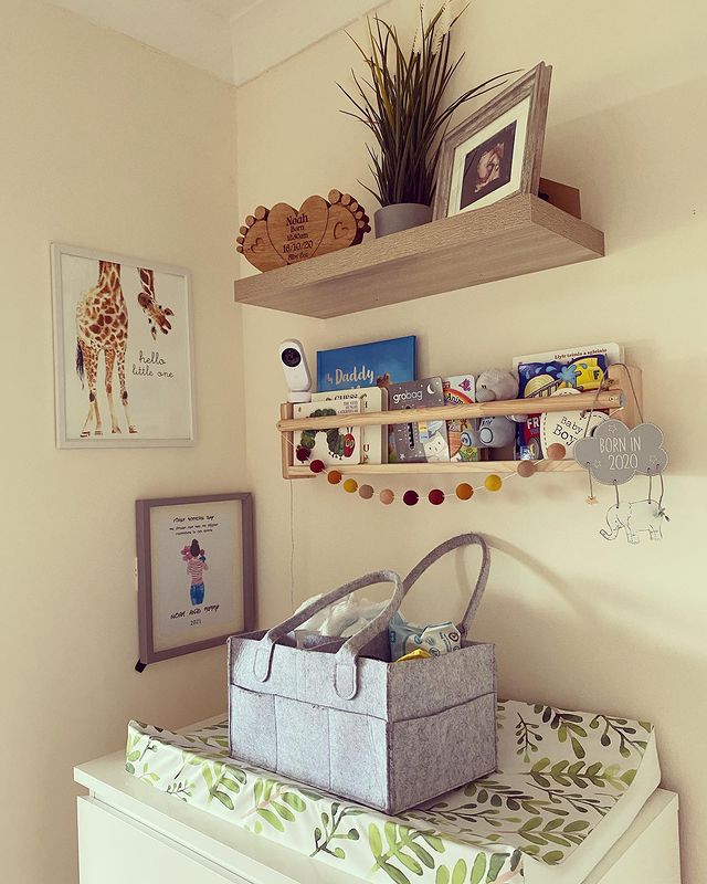 Baby Nursery with Changing Table on a Dresser and Good Use of Vertical Space. Photo by Instagram user @ourwestwaleshome