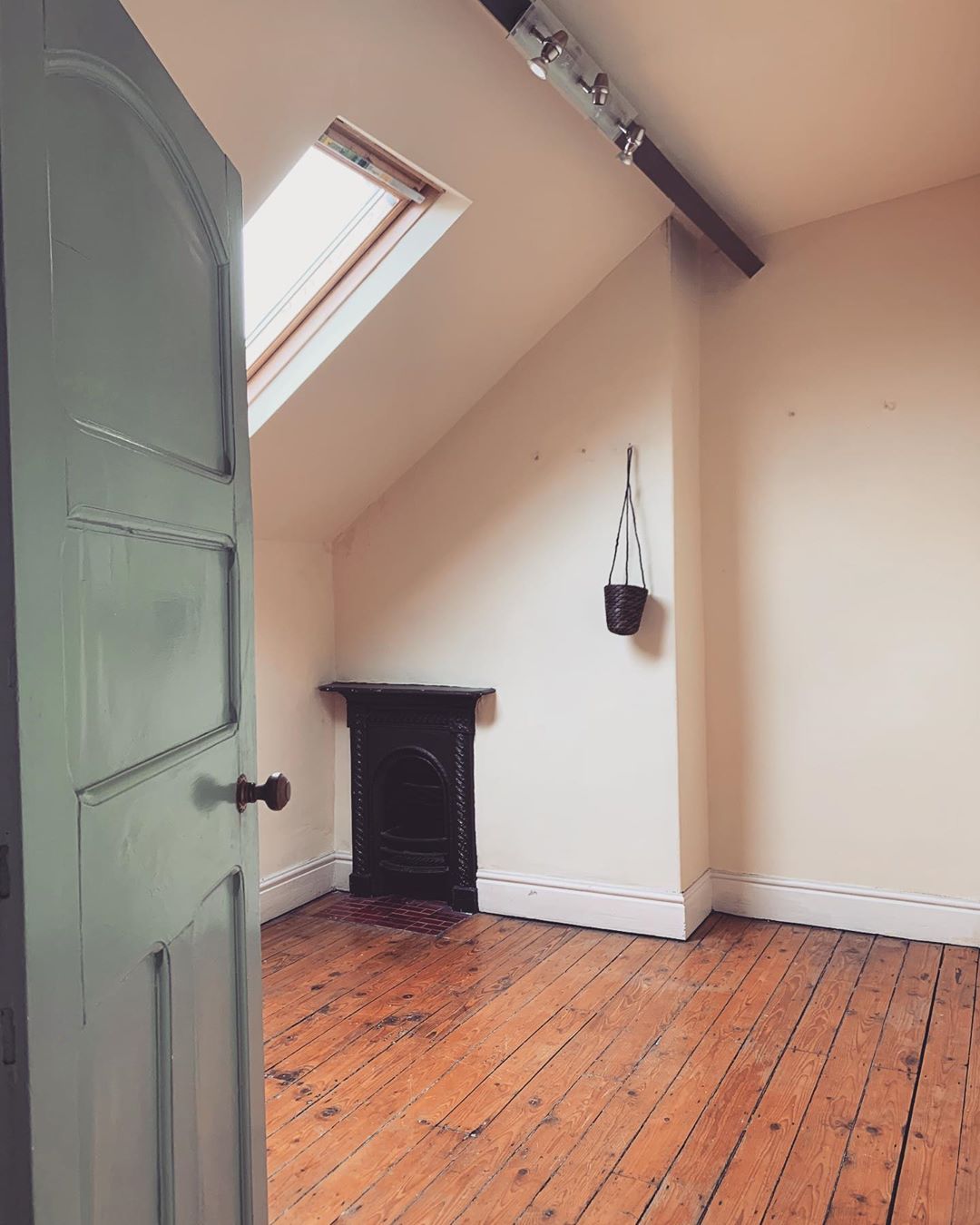 Clean attic space with wood floor. Photo by Instagram user @sal_at_six