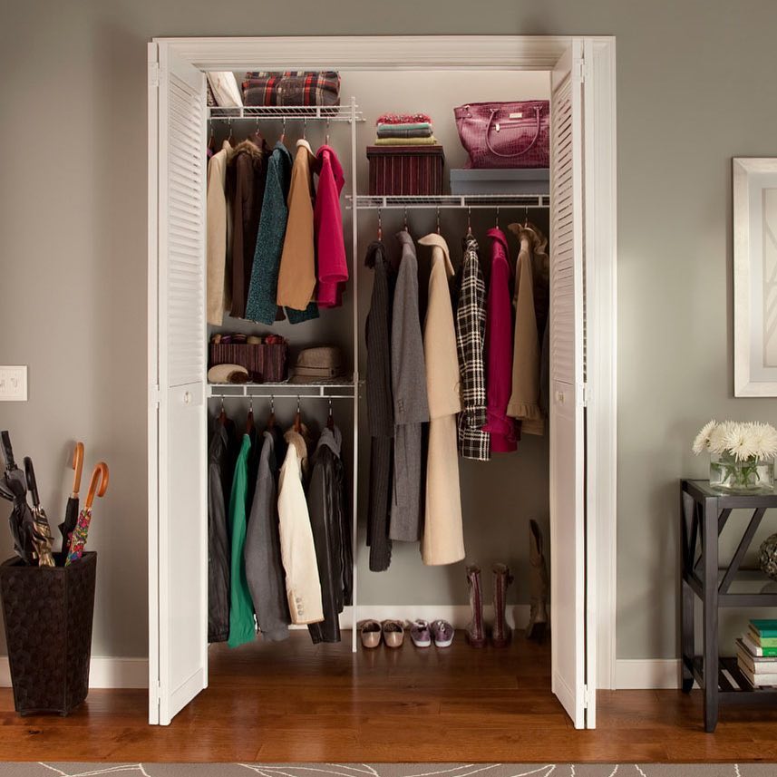 Hallway Closet Filled with Hanging Coats. Photo by Instagram user @organisemyhomeuk