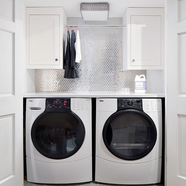 Modern Laundry Room with Spacious Cupboards. Photo by Instagram user @alluredesignstudio