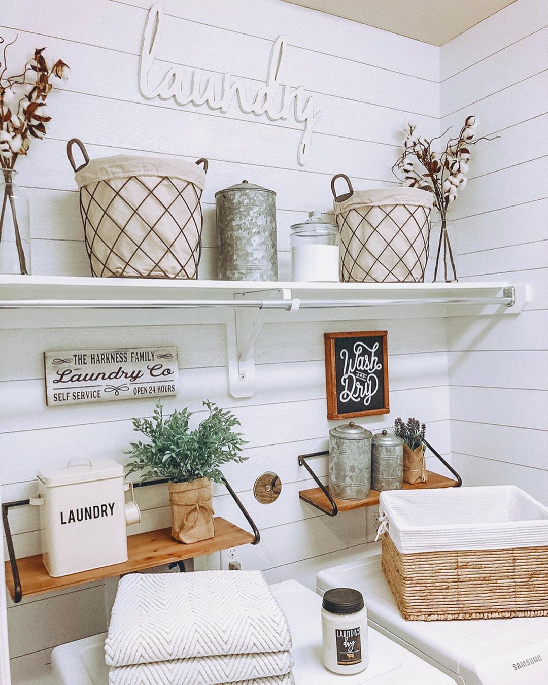 Laundry Room with Shelves for Storage and Supplies on Walls. Photo by Instagram user @harknesshomestylist