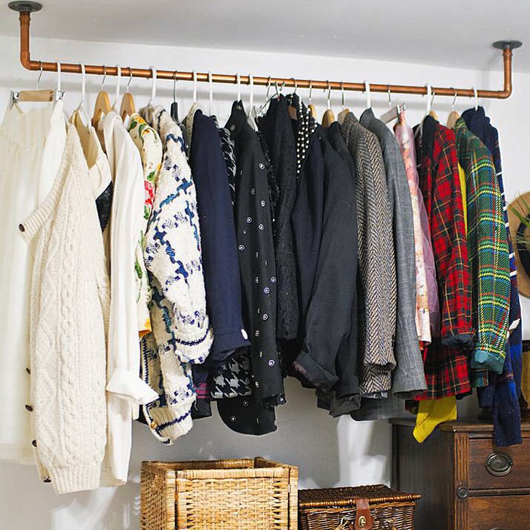 Clothing rack in storage room. Photo by Instagram user @ocdaz