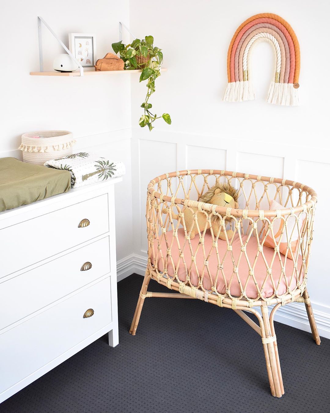 Bassinet and changing table in corner. Photo by Instagram user @mykindofbliss