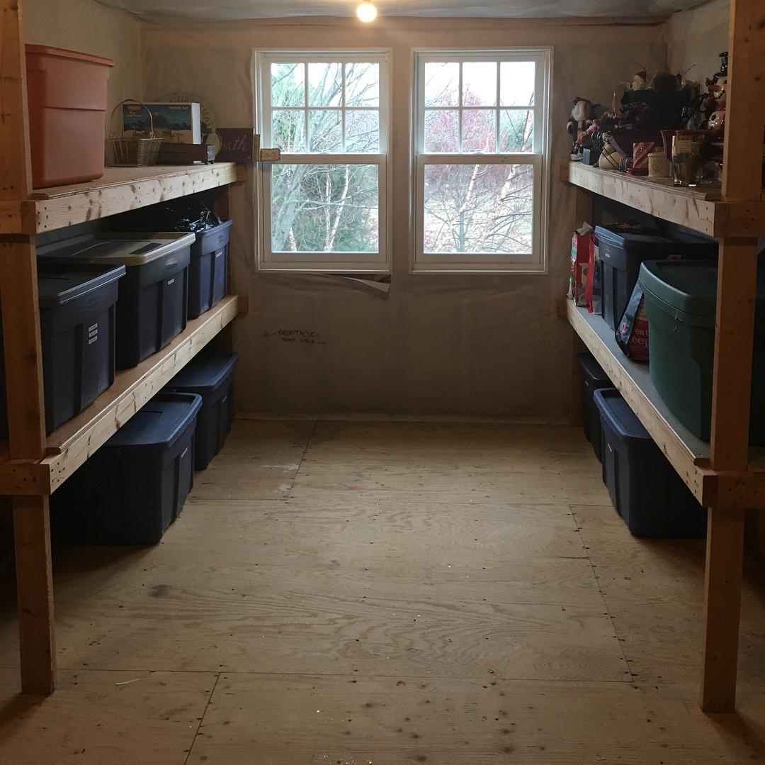 Organized attic storage. Photo by Instagram user @kindredorganizing