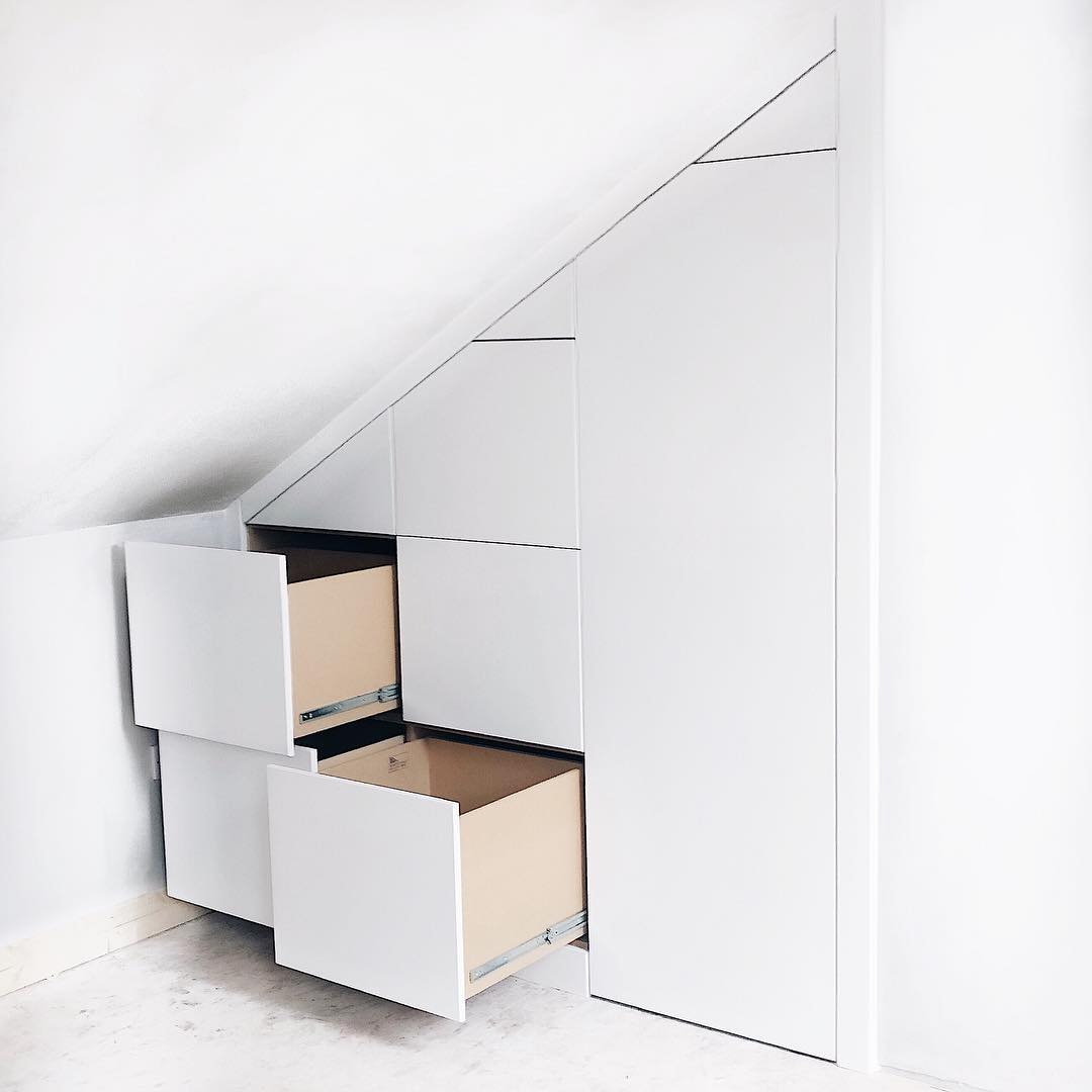 Smart storage drawers in angled wall. Photo by Instagram user @clever_closet