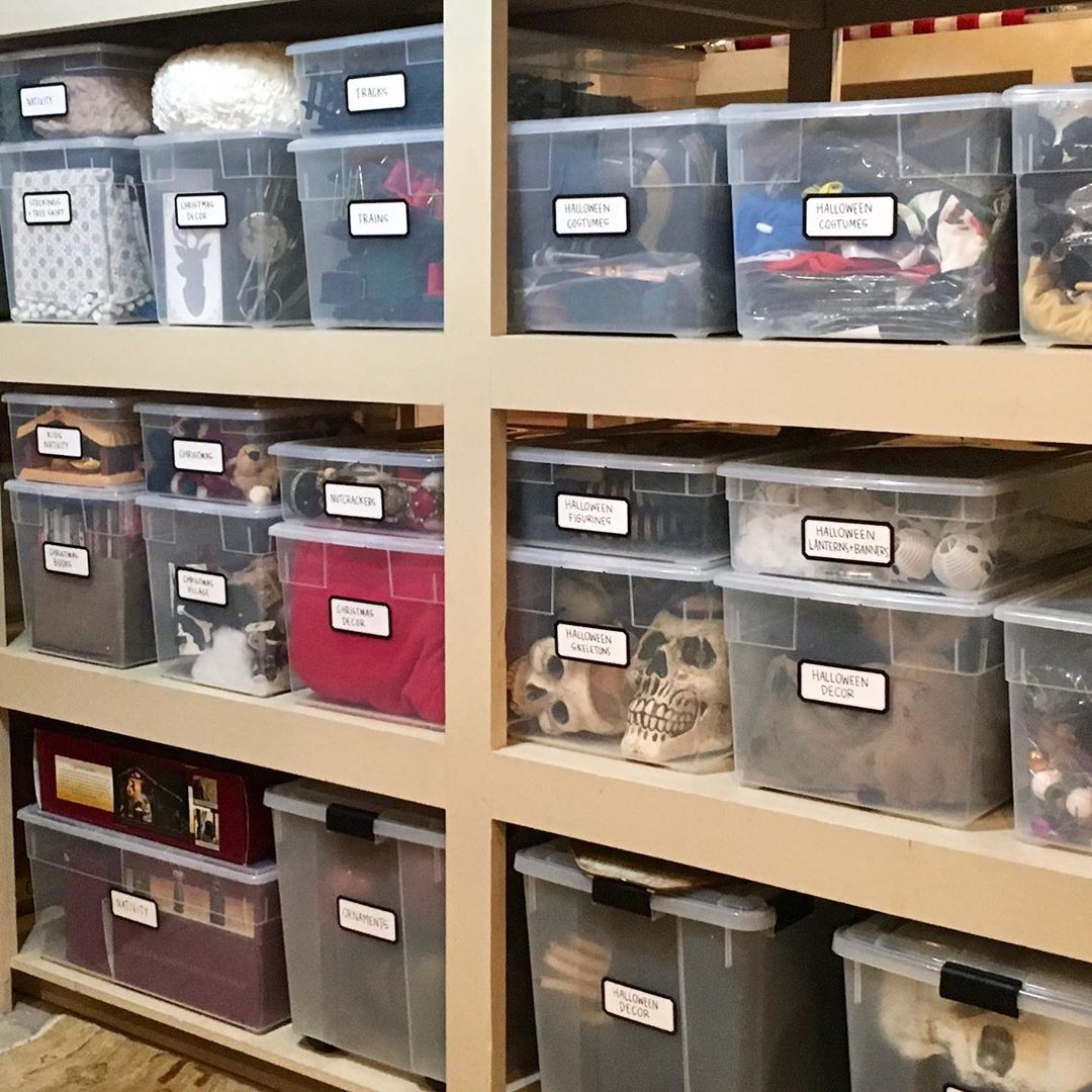 Labeled storage bins in storage room. Photo by Instagram user @organizewithtracy