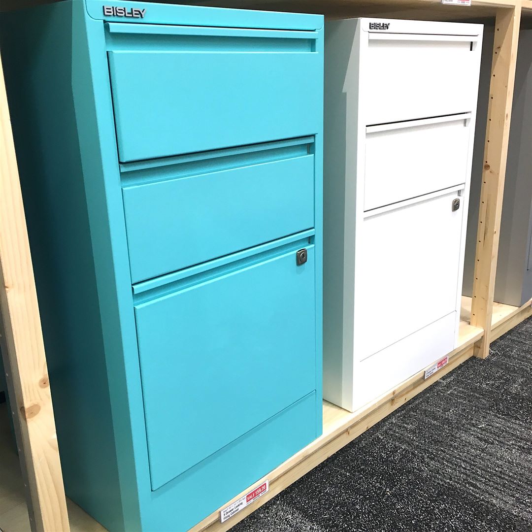 White and blue filing cabinets. Photo by Instagram user @refined_rooms