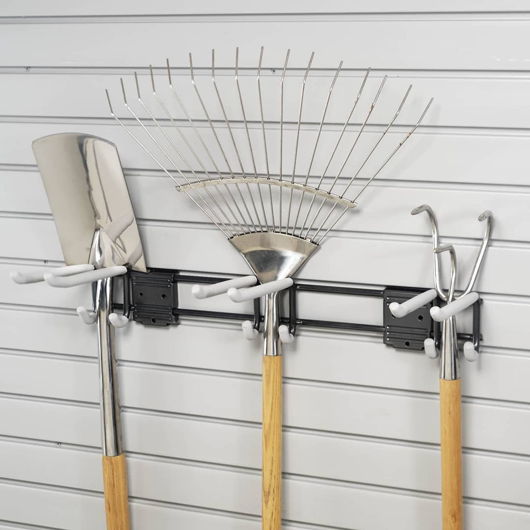 large gardening tools holding long handled tools photo by Instagram user @tailoredlivingmadison