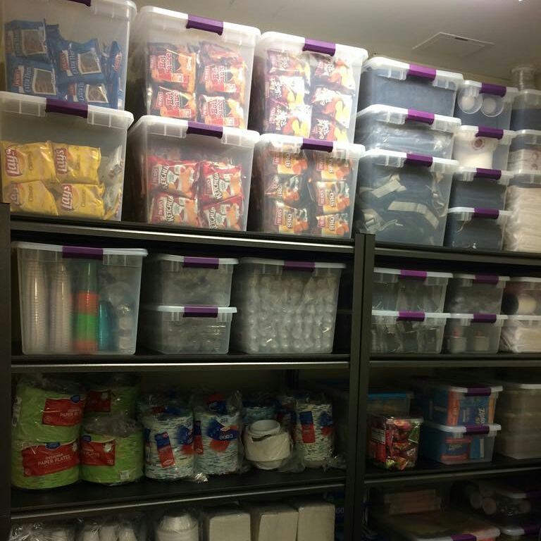 Clear storage containers in storage room. Photo by Instagram user @organizewithshevie