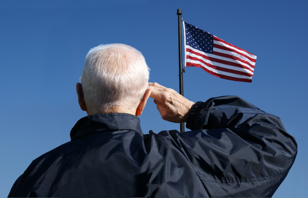 Veteran saluting the flag