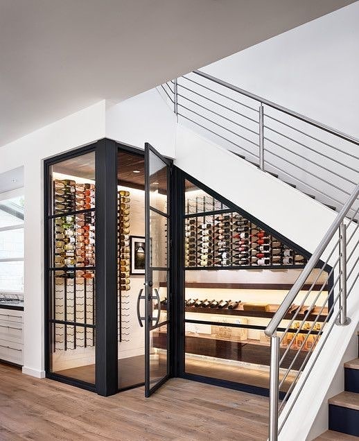 Wine Cellar Underneath Staircase. Photo by Instagram user @adesignaffair