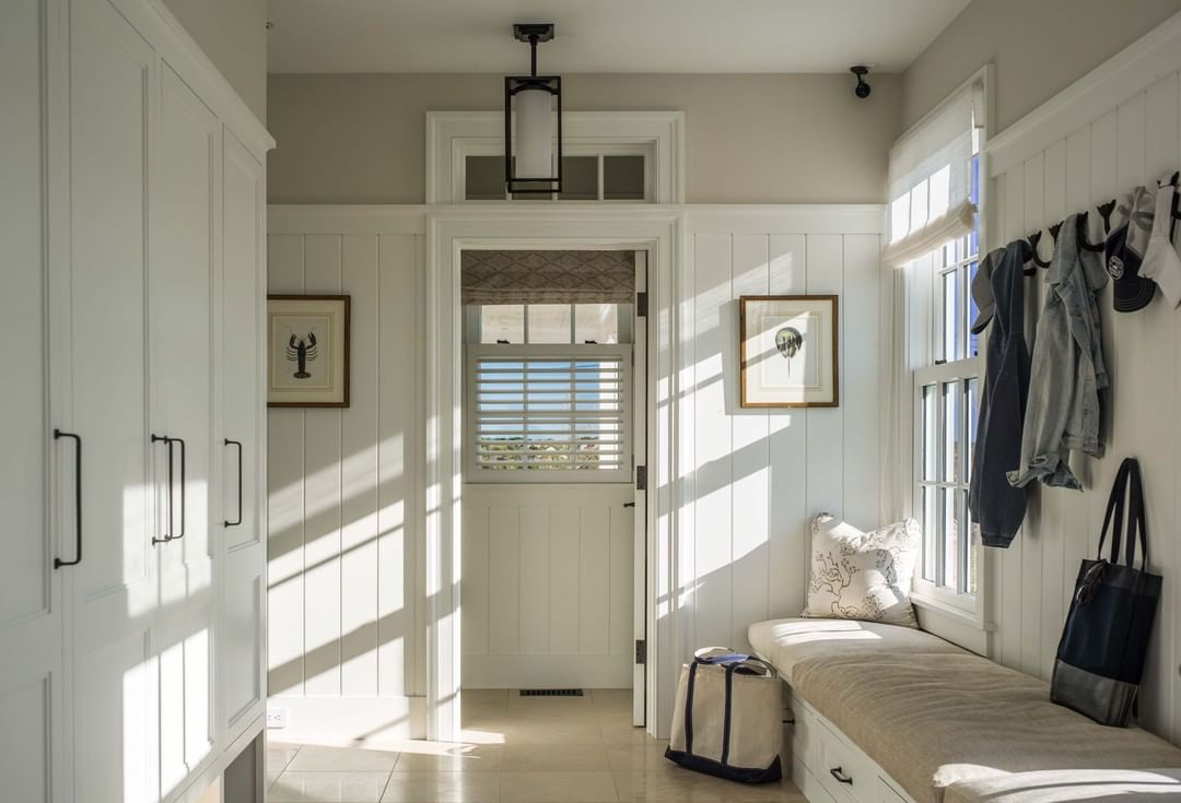 Large Mudroom with Storage Cabinets and Bench. Photo by Instagram user @pinneydesigns