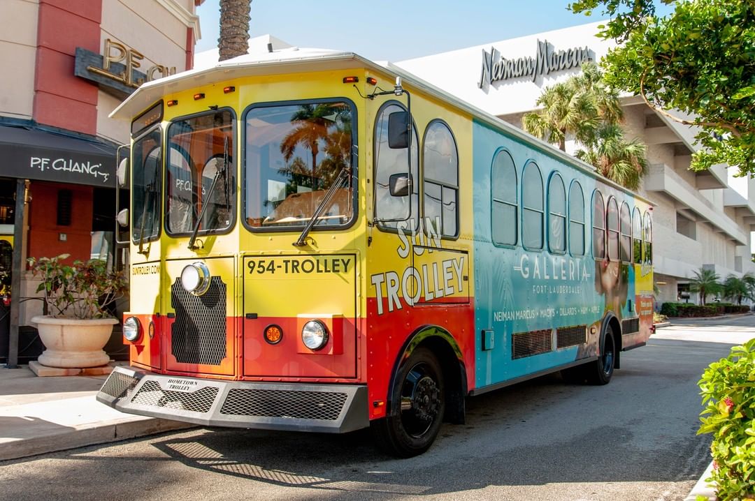 Yellow, red, and blue fort lauderdale trolley. Photo by Instagram user @suntrolley