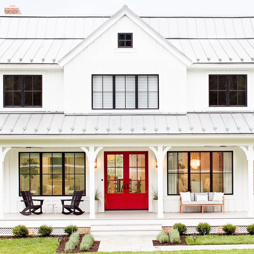 Farmhouse-style home with large porch. Photo by Instagram user @thefrenchrooster