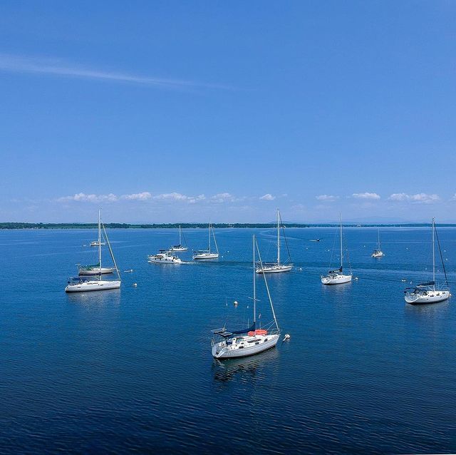 Boats Anchored in the Water at Lake Champlain. Photo by Instagram user @todd_collins70