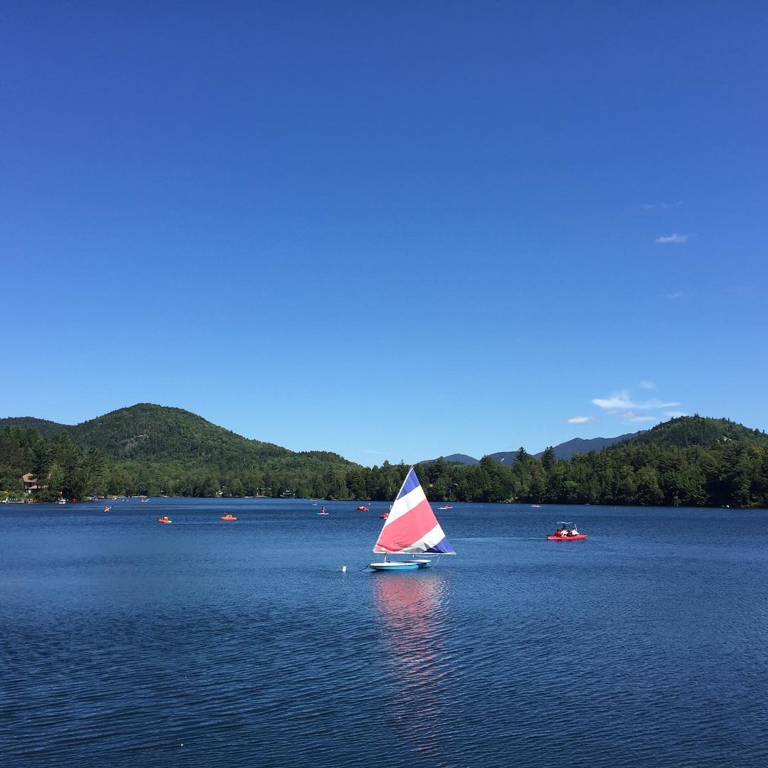 Dinghy on the Water at Lake Placid. Photo by Instagram user @lakeplacidadk