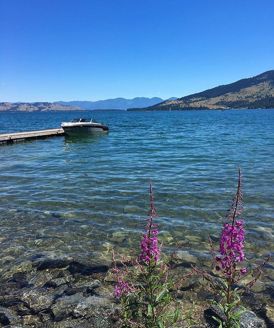 Boat on the Water at Flathead Lake. Photo by Instagram user @flatheadlakemontana