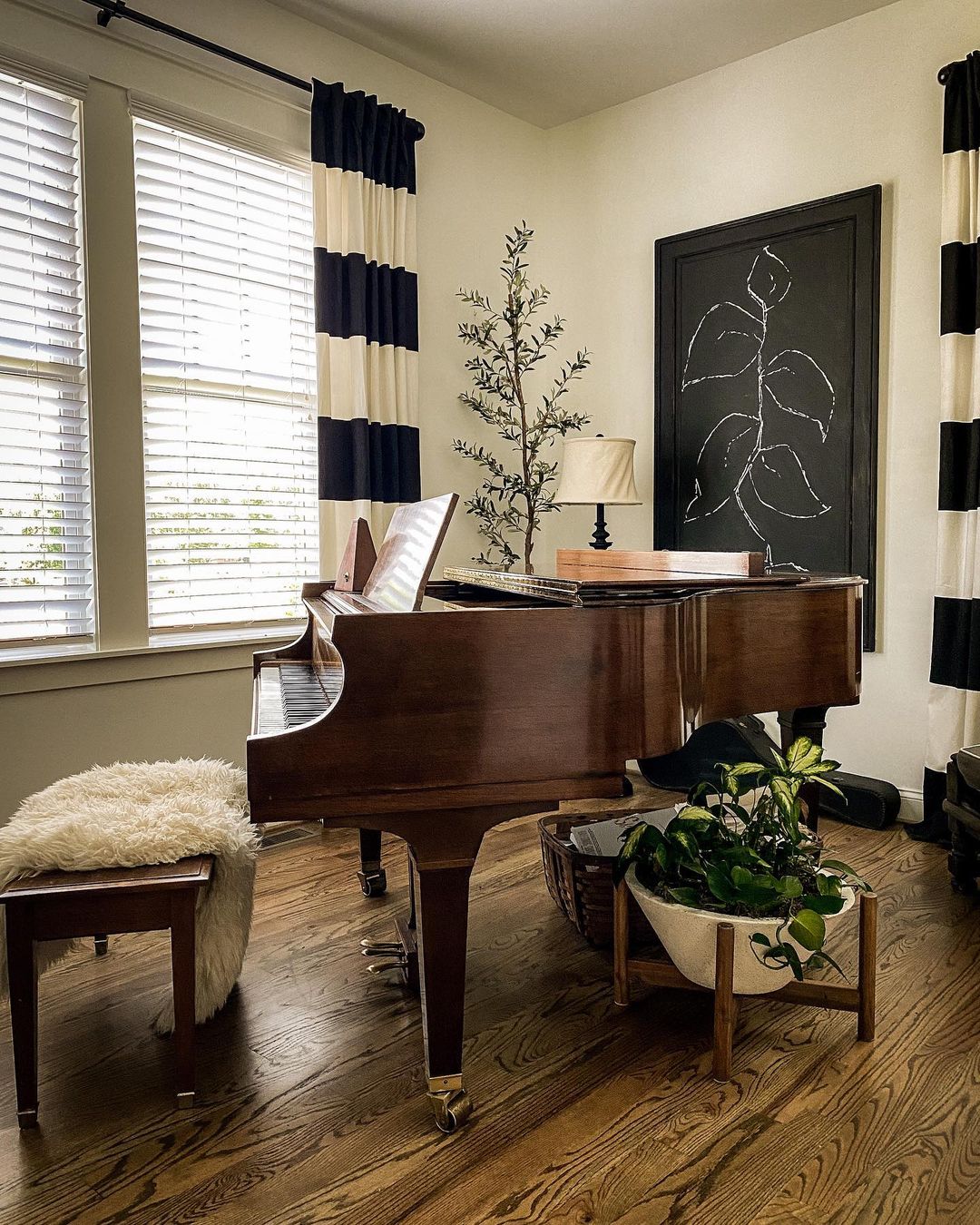 Small Music Room Set Up with a Piano. Photo by Instagram user @downtoearth.style