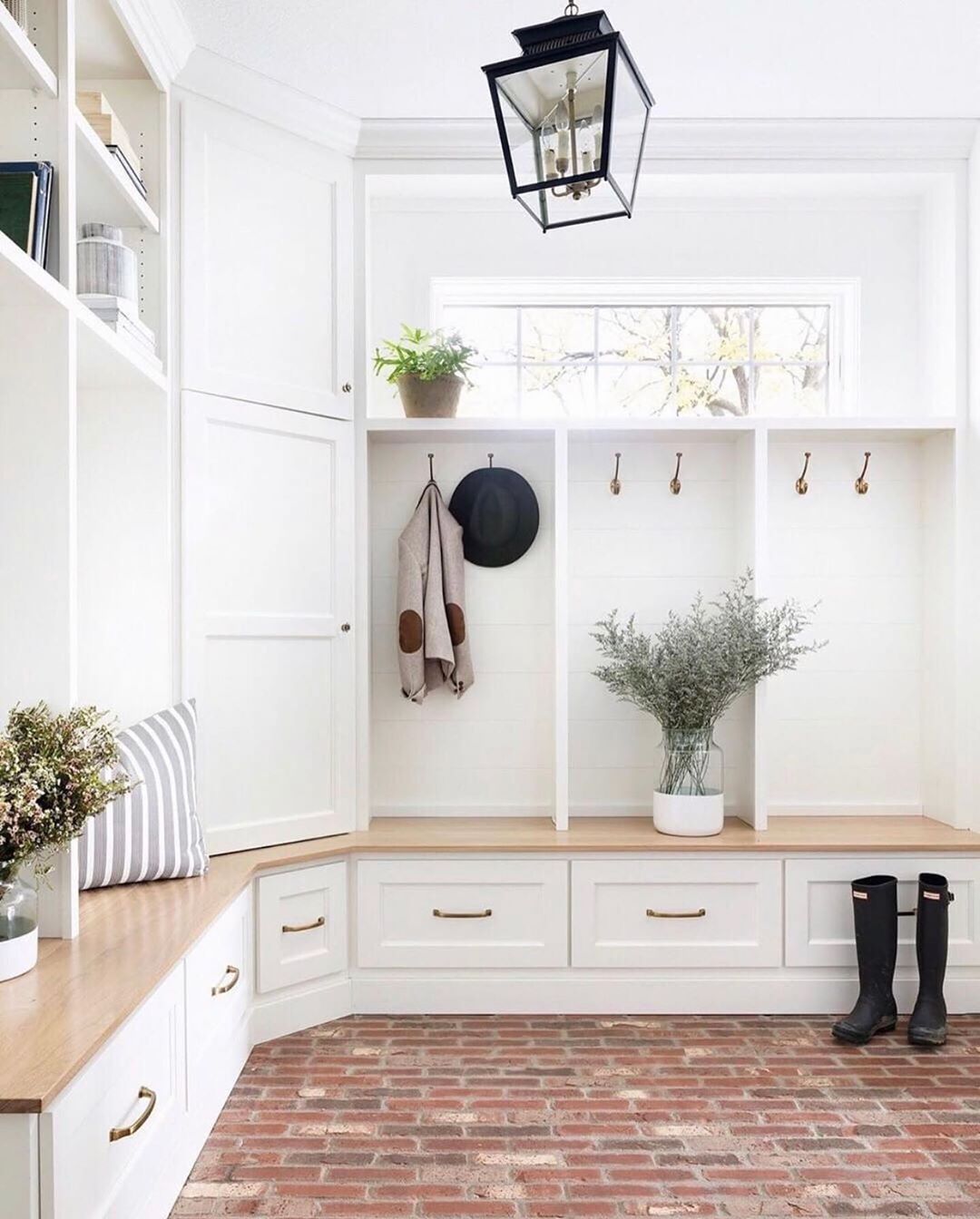 Farmhouse-style mudroom. Photo by Instagram user @happenings_of_our_farmhome