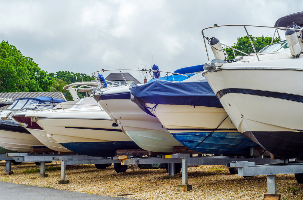 Row of boats in outdoor storage