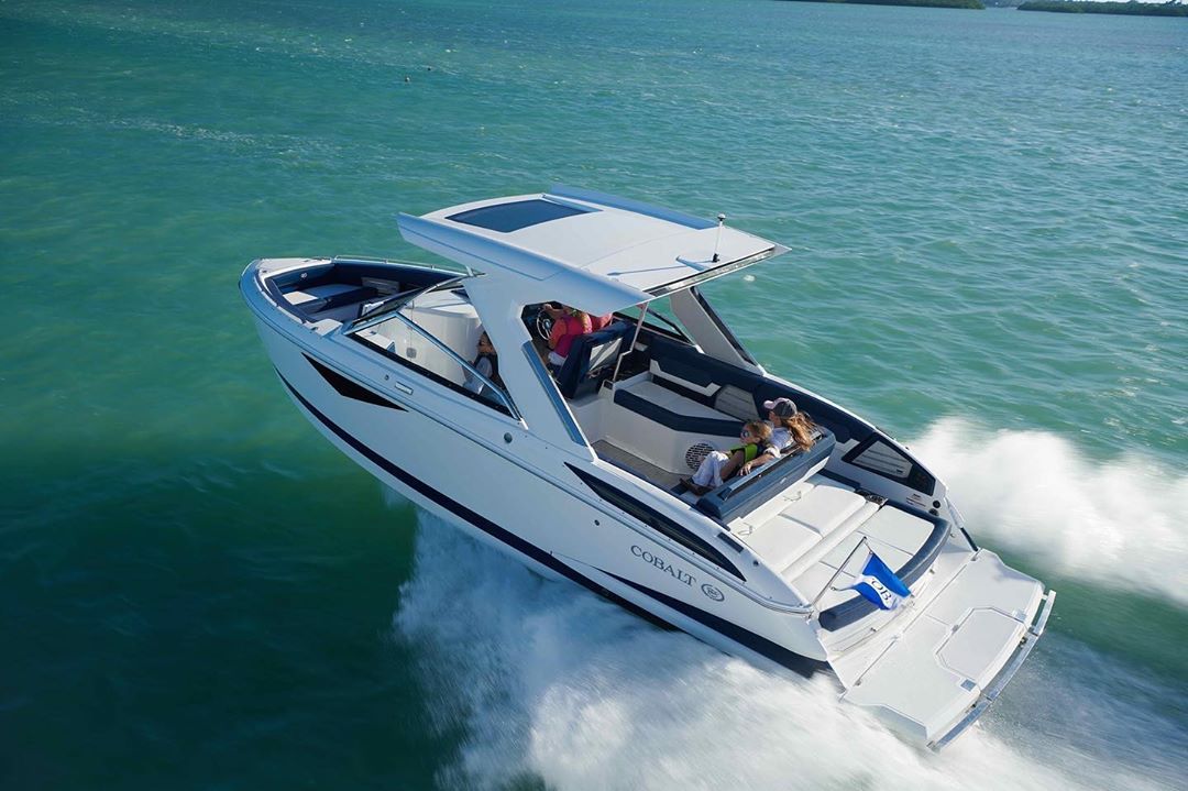 bowrider boat with top on the water photo by Instagram user @cobaltboatsaustralia