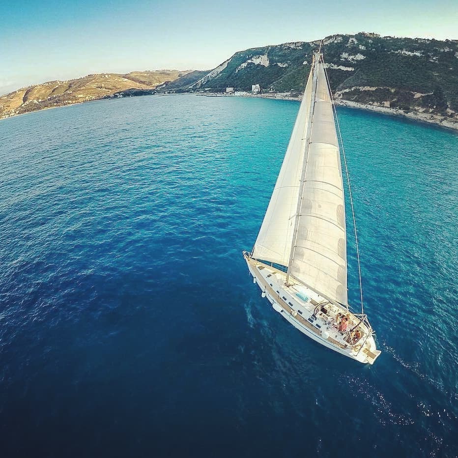 sailboat in deep blue water photo by Instagram user @netasailing