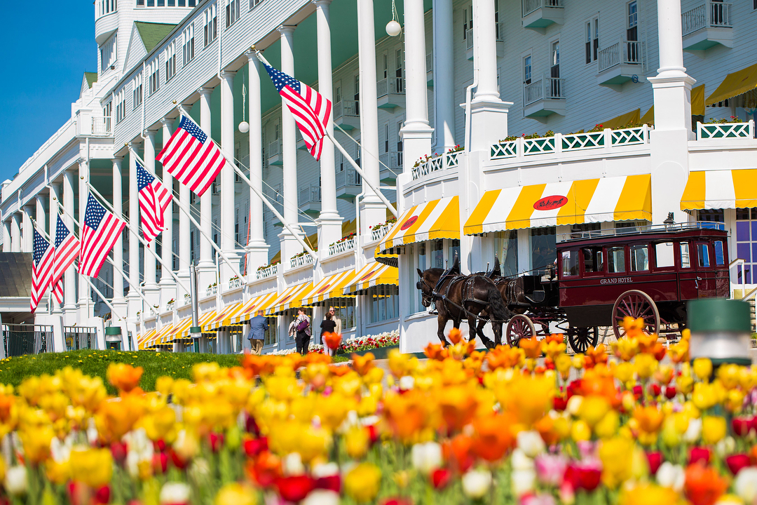 Colorful Tulips in Front of the Grand Hotel in Michigan. Photo by Instagram user @grandhotelmichigan