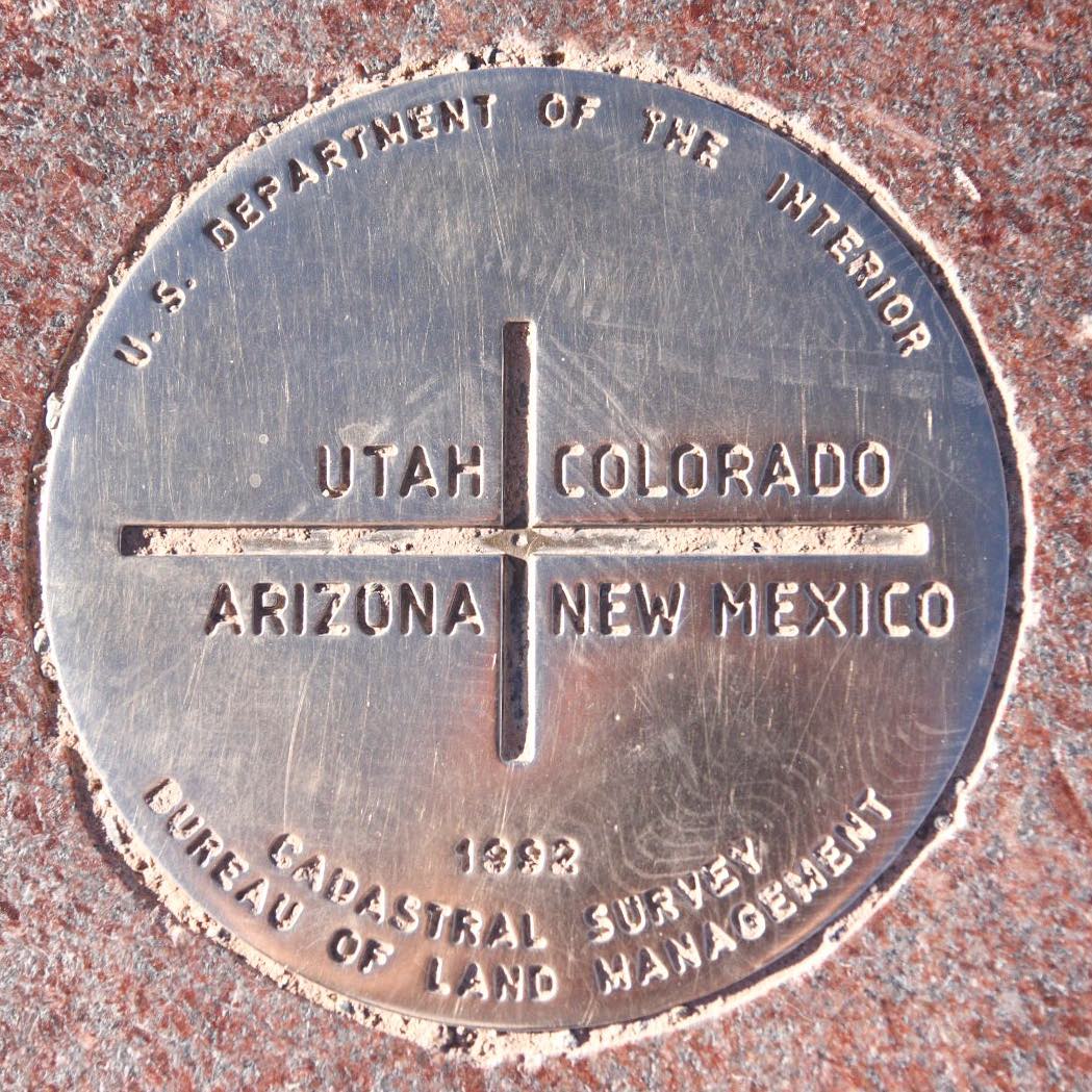 Marker on Ground Where People Can Stand in Arizona, Utah, Colorado, and New Mexico at Once. Photo by Instagram user @5280aperture