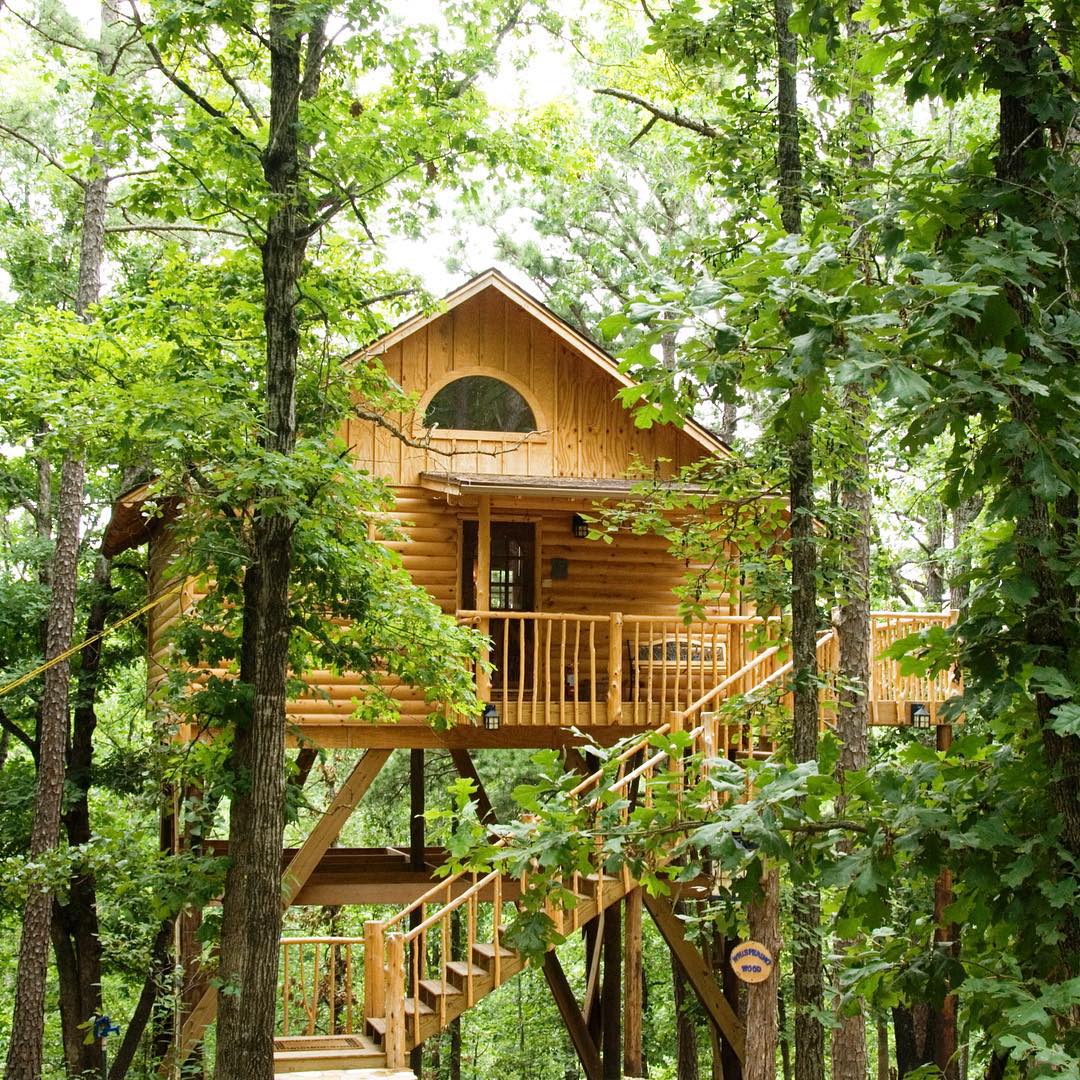 Elevated Treehouse Cottage in a Forest in Arkansas. Photo by Instagram user @treehousecottages