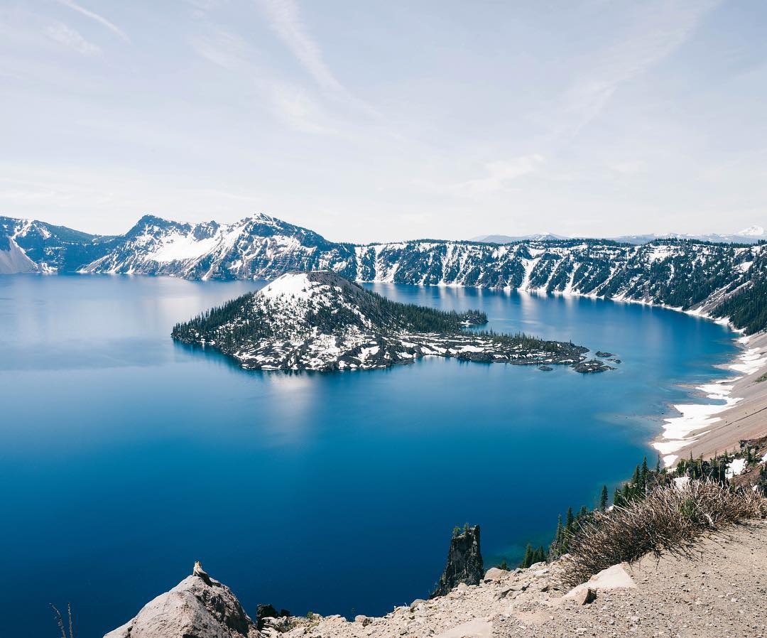 Icy Mountain in the Middle of a Lake in Crater Lake National Park. Photo by Instagram user @masamonster