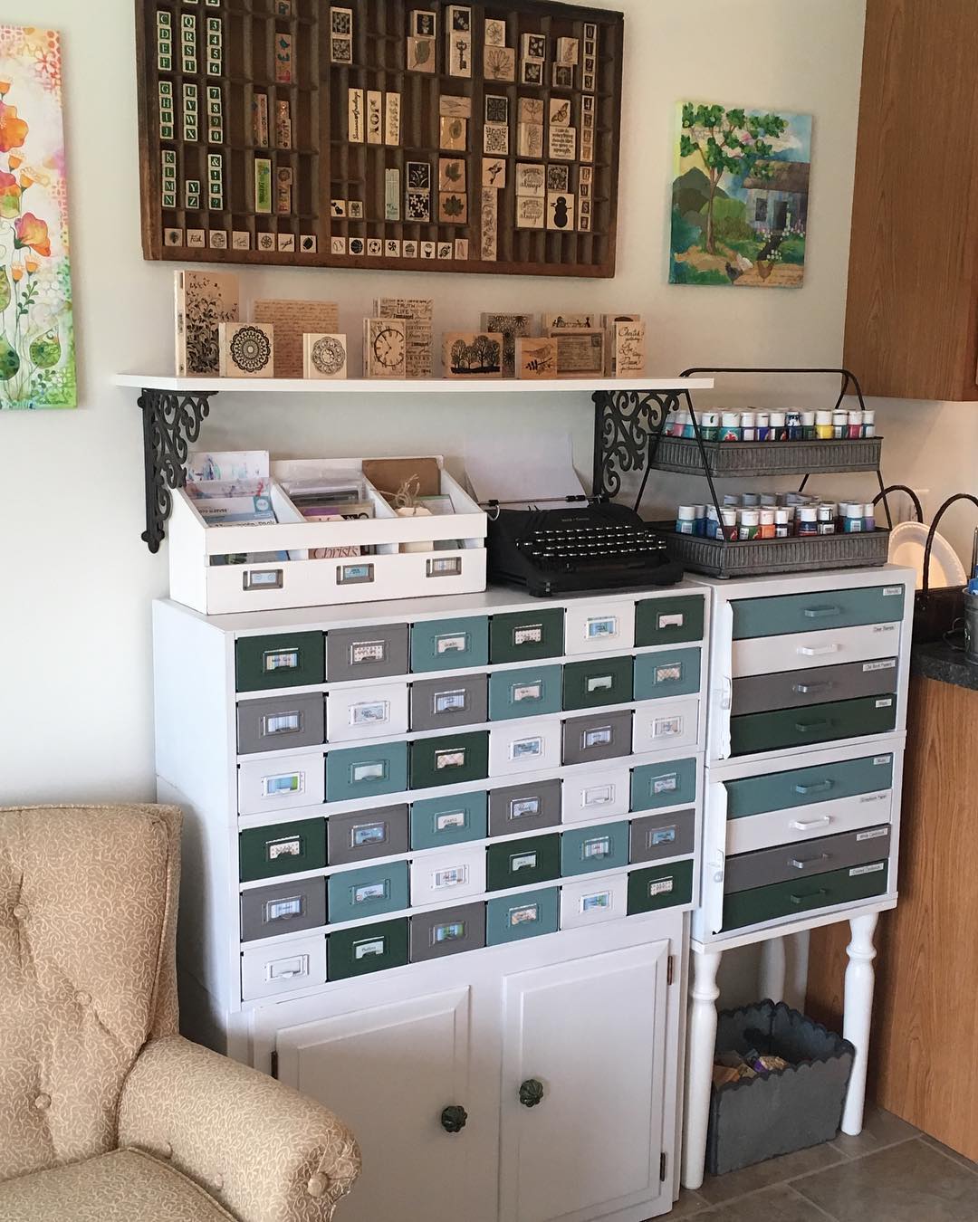 home art studio with old card catalog set up for extra storage photo by Instagram user @bethforenz.art