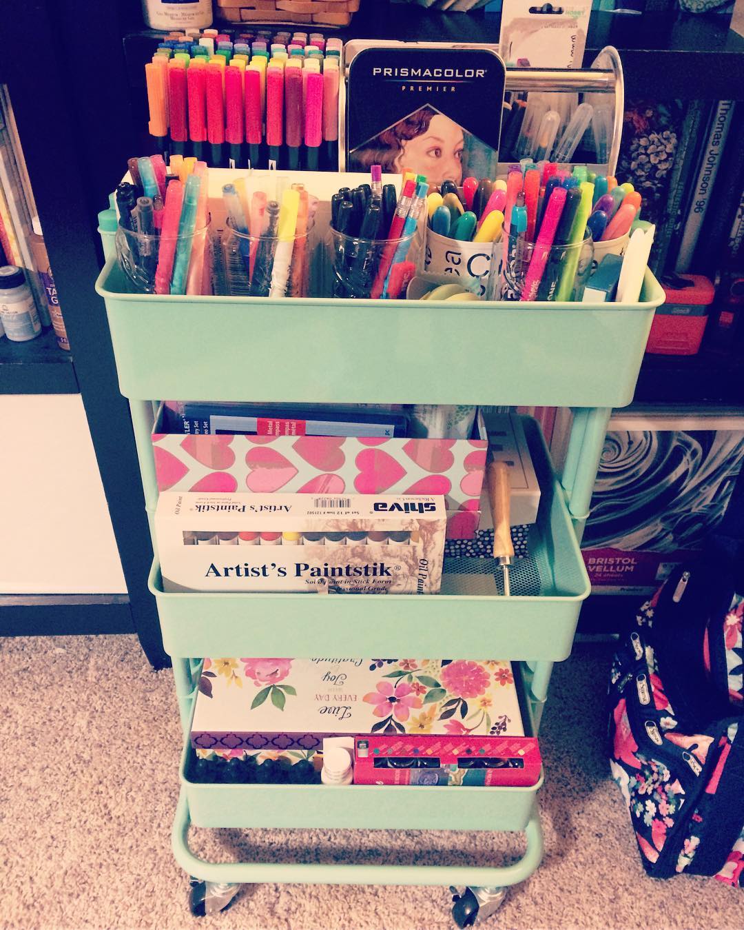 rolling cart holding art supplies that can move around photo by Instagram user @calleygirl80